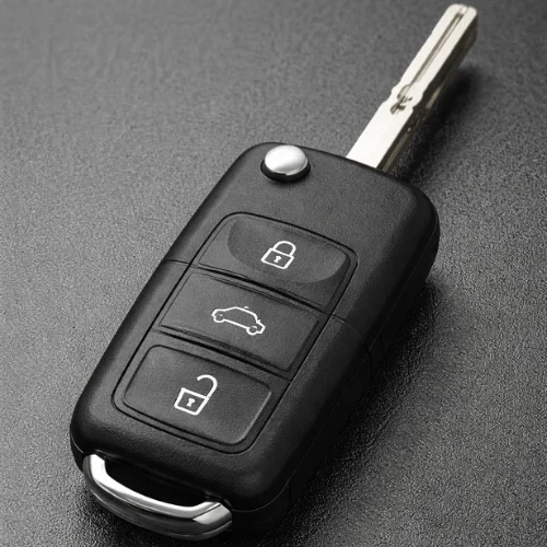Black flip key with buttons folded inside the key fob