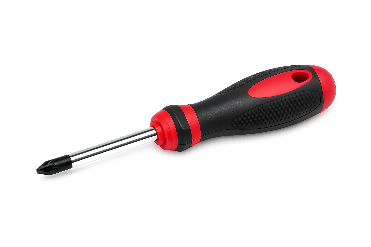 A studio photograph of a professional Phillips head screwdriver isolated on a clean, solid white background. The tool features a thick, ergonomic handle designed with a high-contrast red and black color scheme. The handle is made of black textured rubber with small raised dots for enhanced grip, accented by smooth red plastic sections near the base and cap, including a small hanging hole at the very end. A polished, reflective chrome steel shaft extends horizontally from the red collar, ending in a darkened, magnetic cross-point Phillips tip pointing toward the bottom left corner.